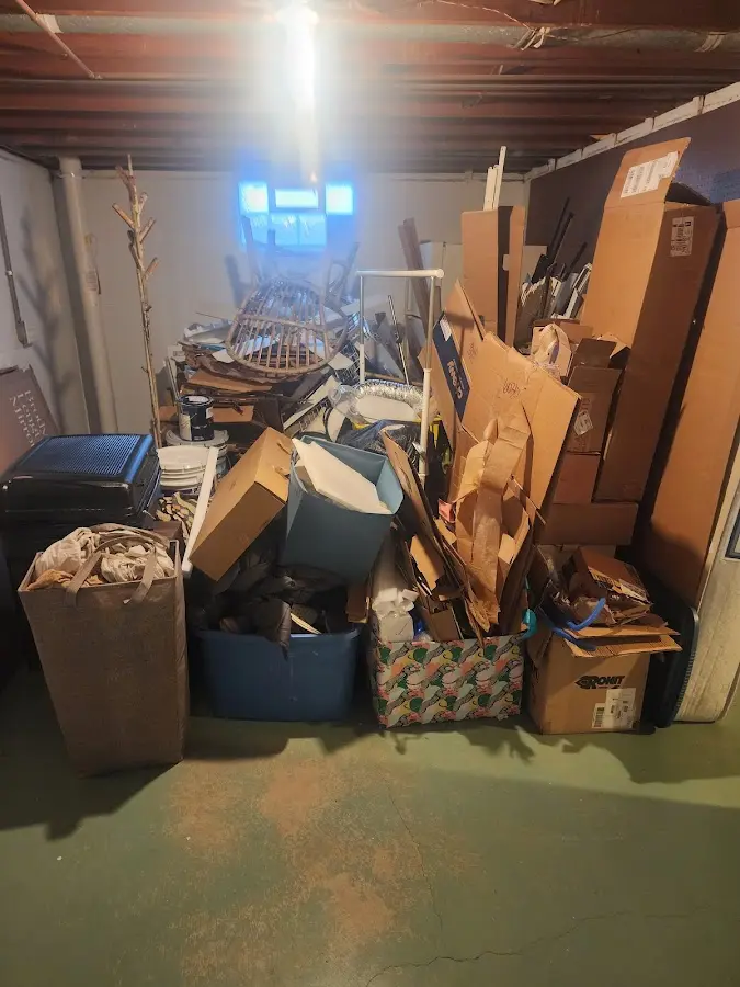 Roll-off dumpster container at job site for 2 Yard Dumpster Rental in Norwood Young America